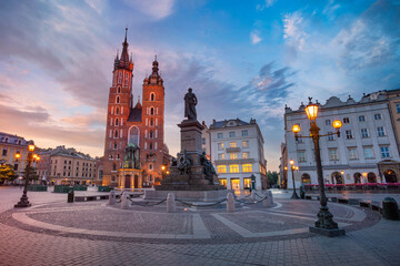 Naklejka na ściany i meble Image of Market square Krakow, Poland during sunrise.