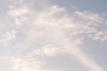 Obraz premium Background Of A Blue Sky Filled With Thin Smoky White Clouds