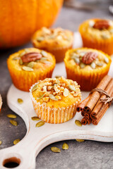 Homemade muffins of pumpkin with pecans. Autumn menu