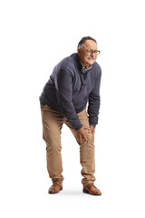 Fototapeta premium Mature man standing and holding his painful knee