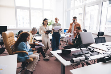 Businesspeople working on projects in office