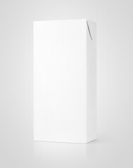 Milk or juice carton package on gray background with clipping path