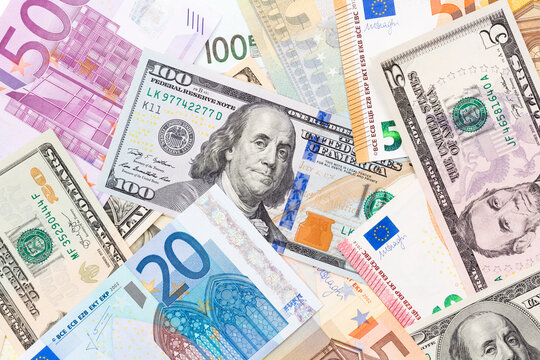 Background made of euros and dollars.  High resolution photo.