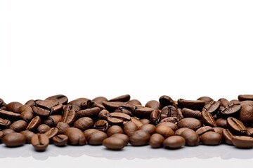a heap of freshly roasted coffee beans on a clean white background