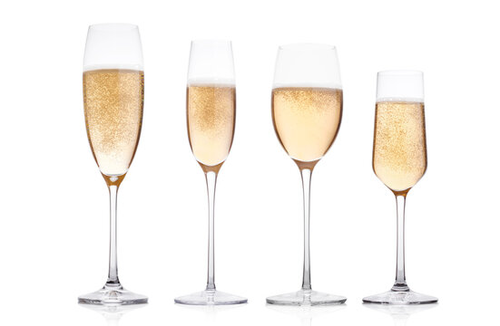 Champagne glasses with bubbles on white background with reflection