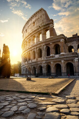 Fototapeta na wymiar Great roman Colosseum in morning sunlight, Italy