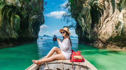 Traveler woman on boat with camera joy nature scenic landscape Ko Hong island Krabi, Attraction...