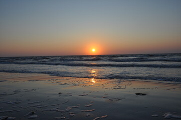 The sun setting over the north sea