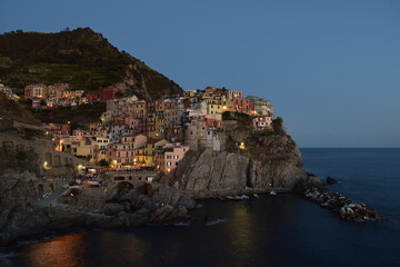Fototapeta na wymiar Manarola may be the oldest of the towns in the Cinque Terre.Tourist attractions in the region include a famous walking trail between Manarola and Riomaggiore called Via dell'Amore