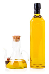 Bottle and jar of oil on a white background