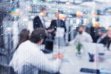 Blurred background of a business people in office with internet network sharing effect