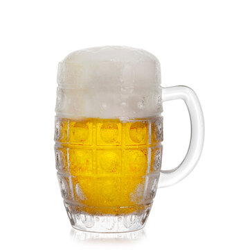 A glass of frothy beer on a white background