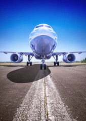 Fototapeta premium airplane on a runway is ready for take off