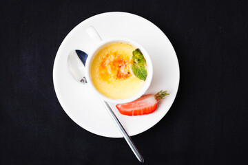 Creme brulee with strawberry foam and sea buckthorn sorbet