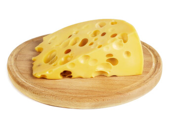 a piece of cheese with large holes lies on a white board