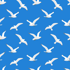 Seamless pattern with sea gulls flying in blue sky.