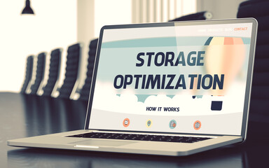 Fototapeta premium Laptop Screen with Storage Optimization Concept on Landing Page. Closeup View. Modern Meeting Room Background. Blurred Image with Selective focus. 3D Rendering.