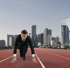 Fototapeta na wymiar Businessman acts like a runner on a track. Competition and challenge in business concept