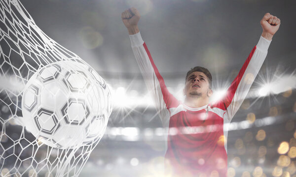 Double exposure image with a ball pierces the soccer goal at the stadium during a night match and a soccer player who is exulting. 3D Rendering