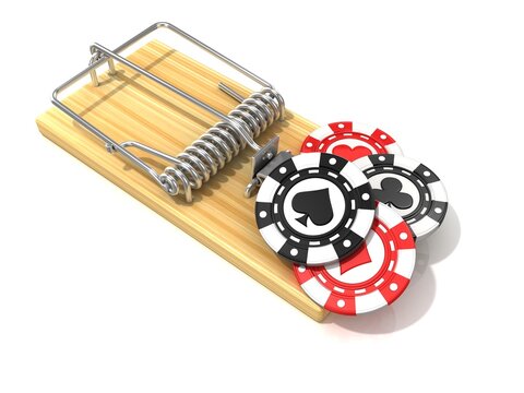 Set of gambling casino chips, like bait, in wooden mousetrap. 3D rendering illustration, isolated on white background.