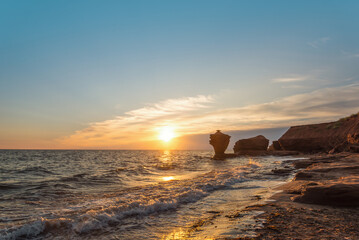 Ocean coast at the sunrise (Thunder Cove, Prince Edward Island, Canada)