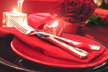 St. Vsalentines day dinner. Valentines daytable setting in rustic elegant style with cutlery. Romantic dinner