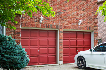 Double Garage door with driveway in Toronto, Canada. Garage door in luxury house. Street photo