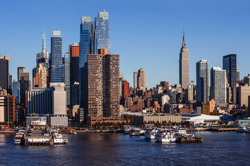 Fototapeta na wymiar Photo of midtown Manhattan cityscape in New York city, taken from a ferry on the Hudson.