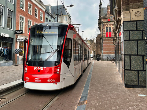 the hague, netherlands - march 21 2023: a dutch htm tram or street car on the streets part of public transport