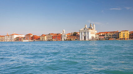 Fototapeta na wymiar Giudecca canal in Venice with St. Mary of the Rosary church, Italy, Europe.