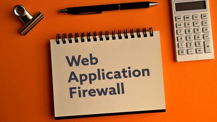 There is notebook with the word Web Application Firewall. It is as an eye-catching image.
