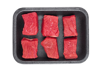 Pieces of fresh raw beef meat in plastic tray on white background