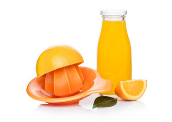 Fresh raw peeled oranges with juice squeezer and glass bottle with leaves on white background