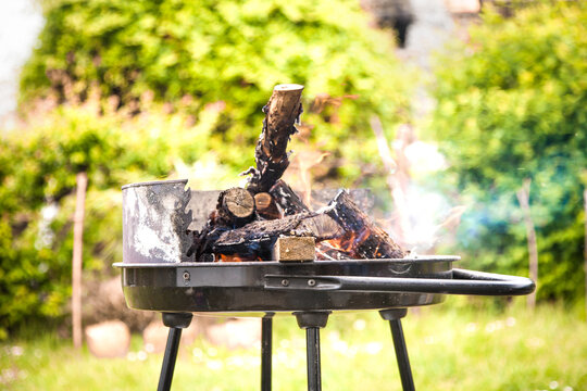 Barbecue in garden. Fire for BBQ grill