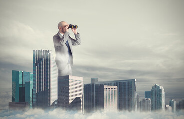 Big businessman emerges from the skyscrapers with binoculars