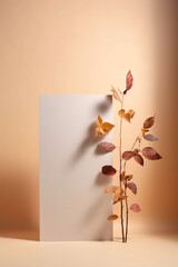 Simple, minimal arrangement, twig with Autumn leaves, sunlight and shadows. Abstract composition showcasing color of the year 2024, Peach Fuzz.