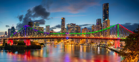 Cityscape image of Brisbane skyline panorama, Australia during dramatic sunset.