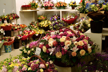 Beautiful bouquets of flowers in the shop window.