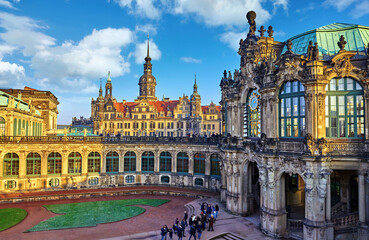Fototapeta na wymiar Dresden, Germany. Zwinger Palace internal yard. View to royal palace residence famous german landmark in old town of capital of Saxony region. Evening sunset with blue sky.