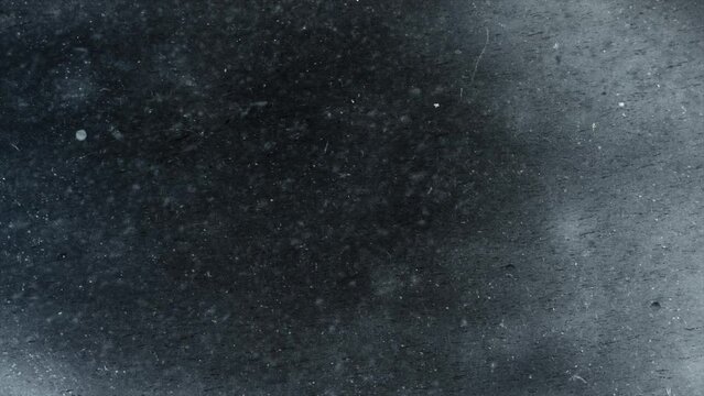 Old black paper with noise and glass texture. Animation