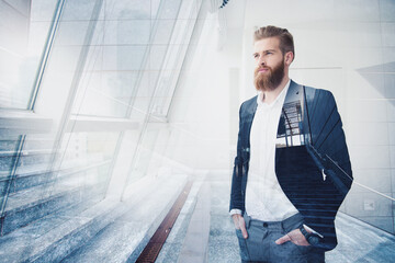 Businessman in office looks far for the future. Concept of innovation and startup. double exposure
