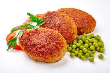 Three fried breaded cutlet with lettuce and parsley isolated on white background