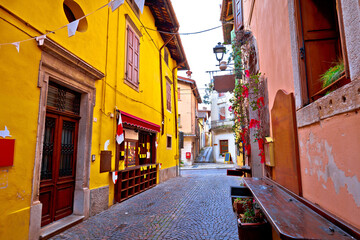 Fototapeta na wymiar Colorful cobbled street of Cividale del Friuli, ancient town in Friuli Venezia Giulia region of Italy