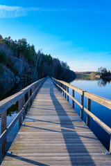 Fototapeta premium Foot bridge across a lake in Gothenburg,Sweden during spring of 2018 April
