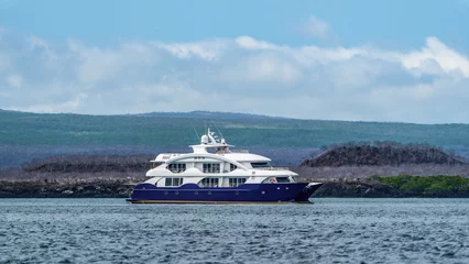 Foto op Canvas A yacht moored in the waters of Galapagos Islands © William Huang