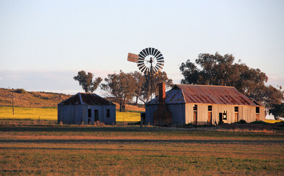 Old farm outbuildings in the warm late afternoon light of day.