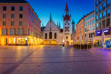 Cityscape image of Marien Square in  Munich, Germany during twilight blue hour.