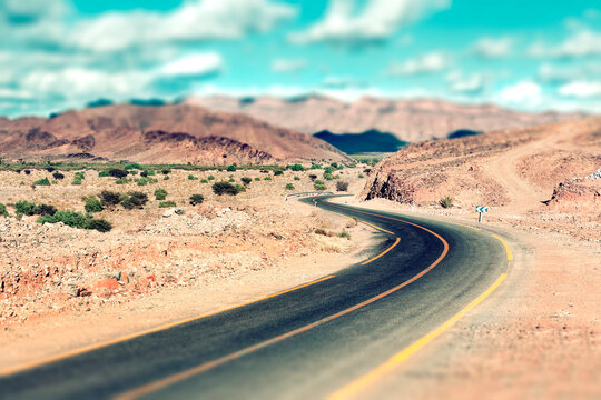 Moroccan desert road,Car travel and scenery.Drive over the world