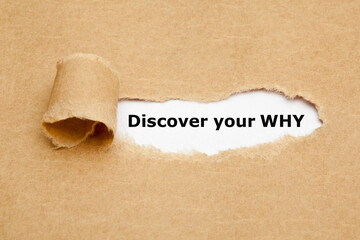 Printed text Discover Your Why appearing behind ripped brown paper.