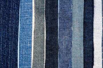 Abstract various torn jeans stripes texture background. Jeans texture. Striped jeans background